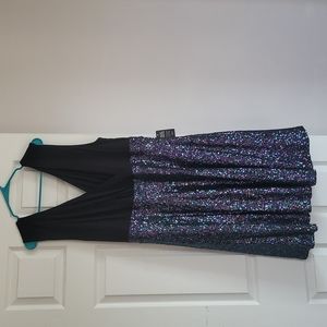 Black top with sequin bottom